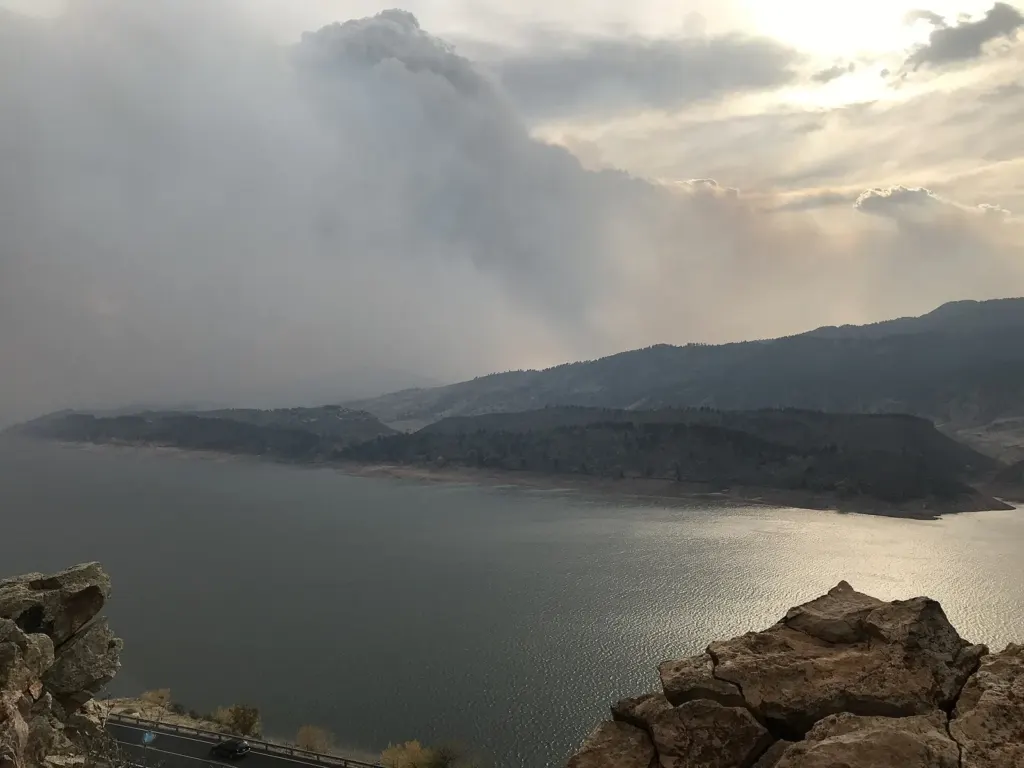 Smoke from the Cameron Peak fire hanging over Horsetooth Reservoir west of Fort Collins