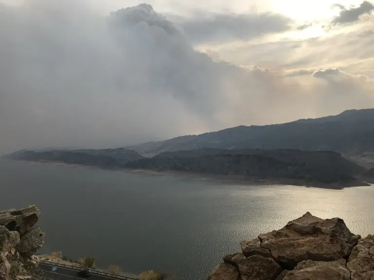 Smoke from the Cameron Peak fire hanging over Horsetooth Reservoir west of Fort Collins