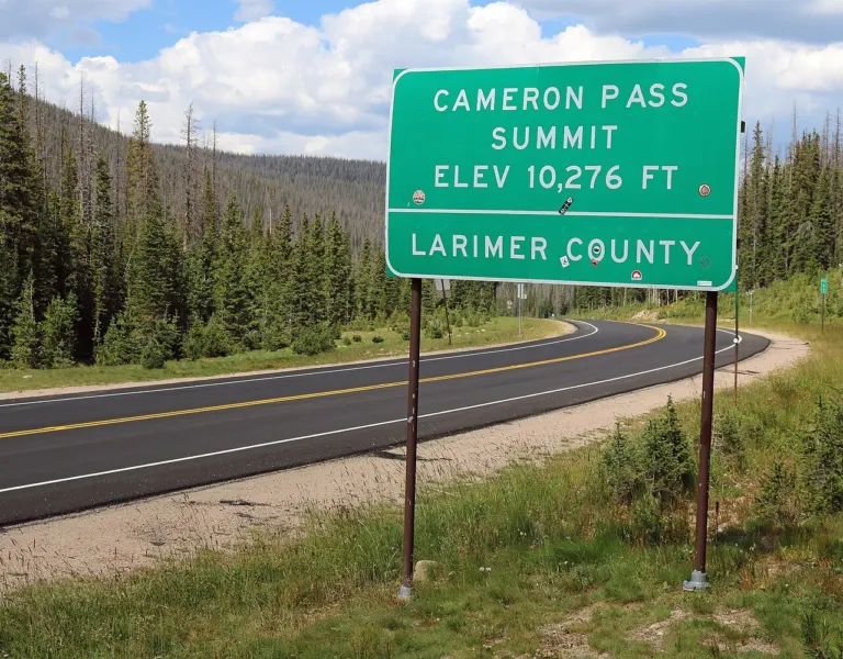 The summit sign at Cameron Pass, elevation 10,276 feet, on Colorado 14
